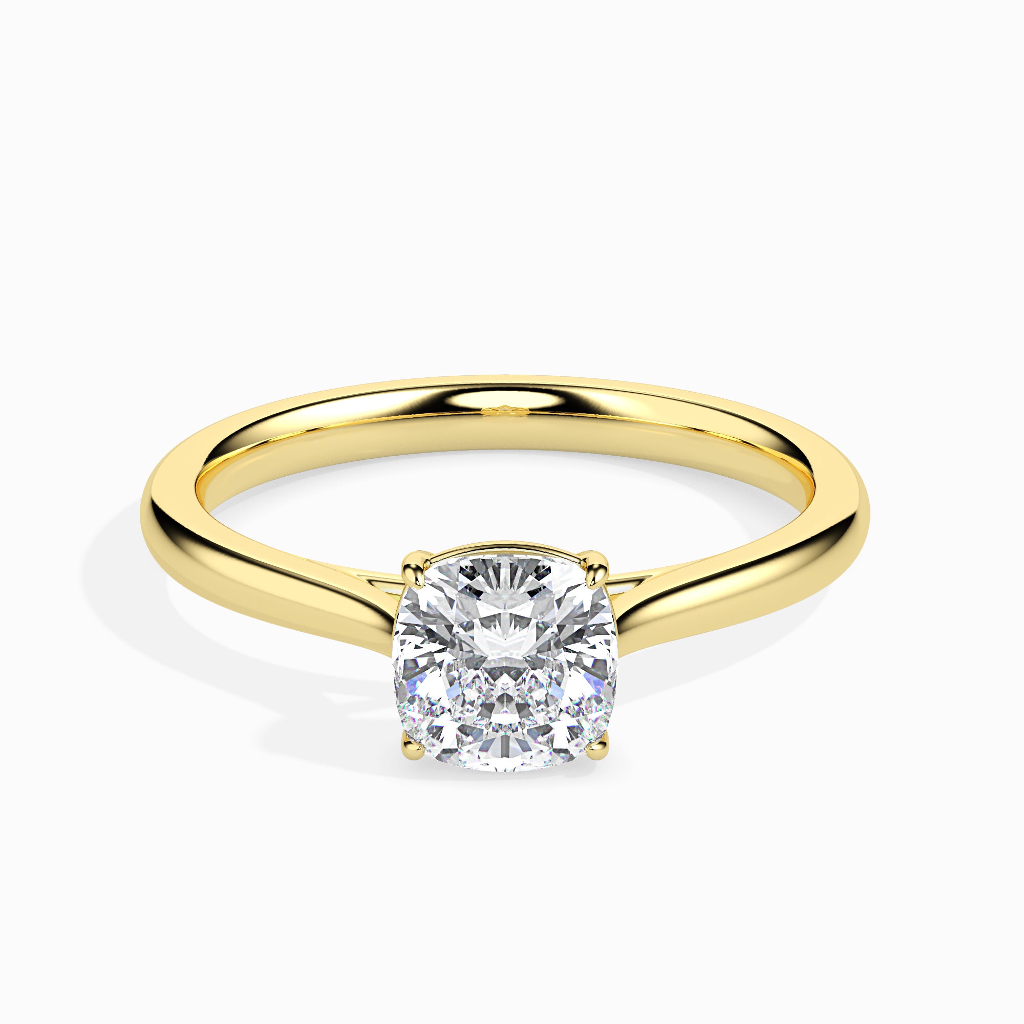 cushion cut solitaire diamond ring in yellow gold
