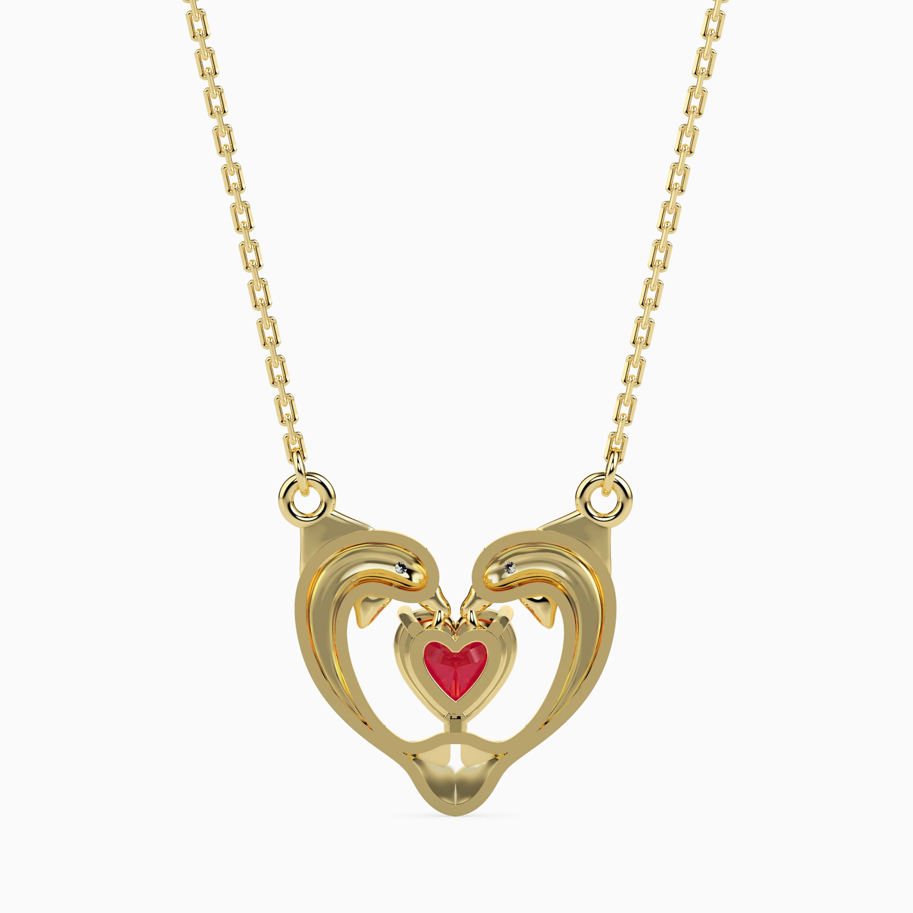 dolphin embrace red heart diamond necklace in yellow gold