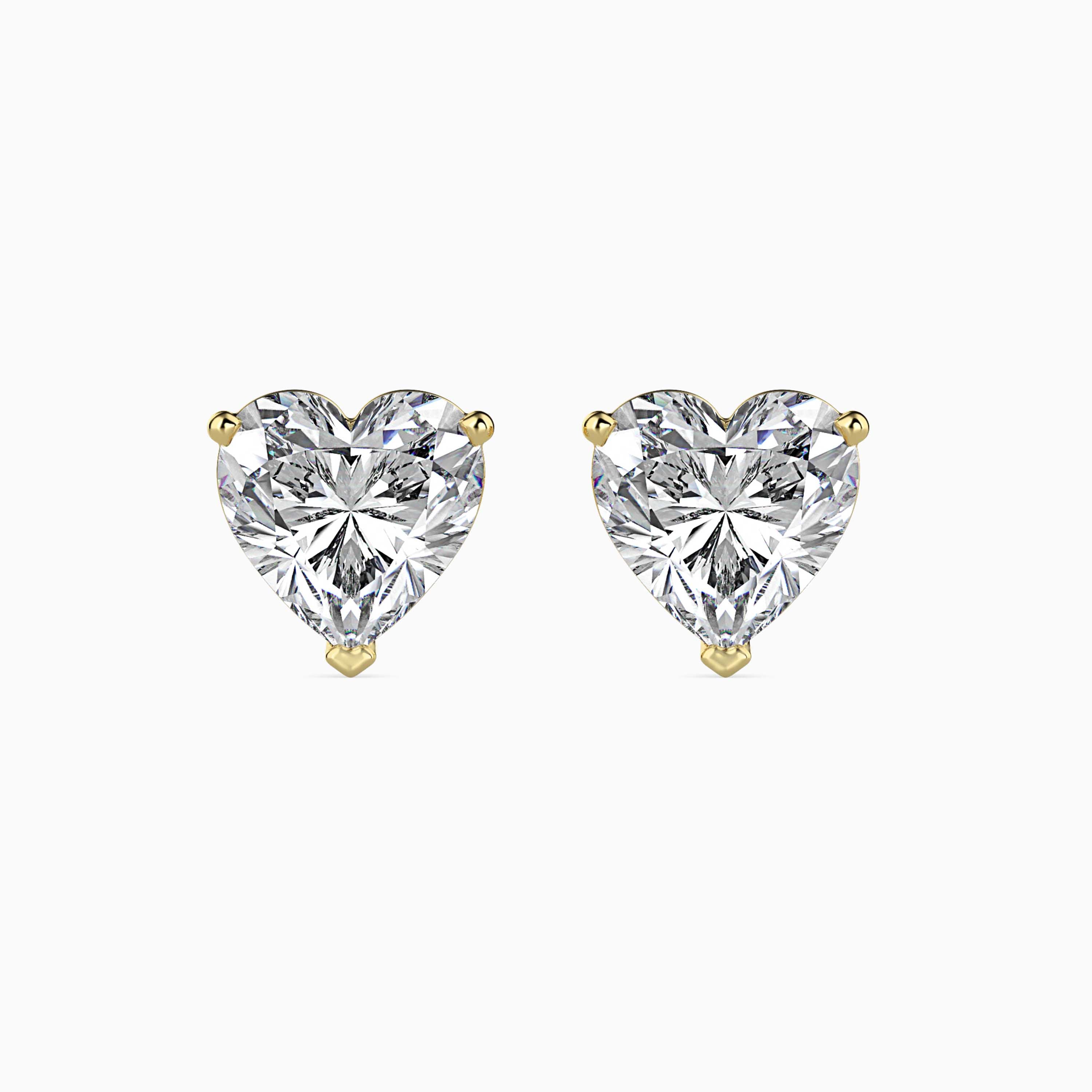 heart prong set diamond stud earrings in yellow gold