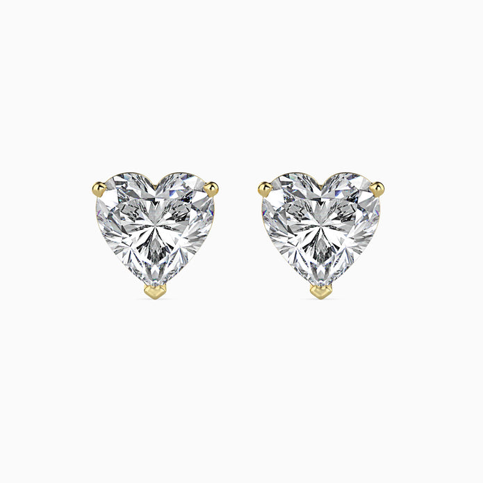 heart prong set diamond stud earrings in yellow gold