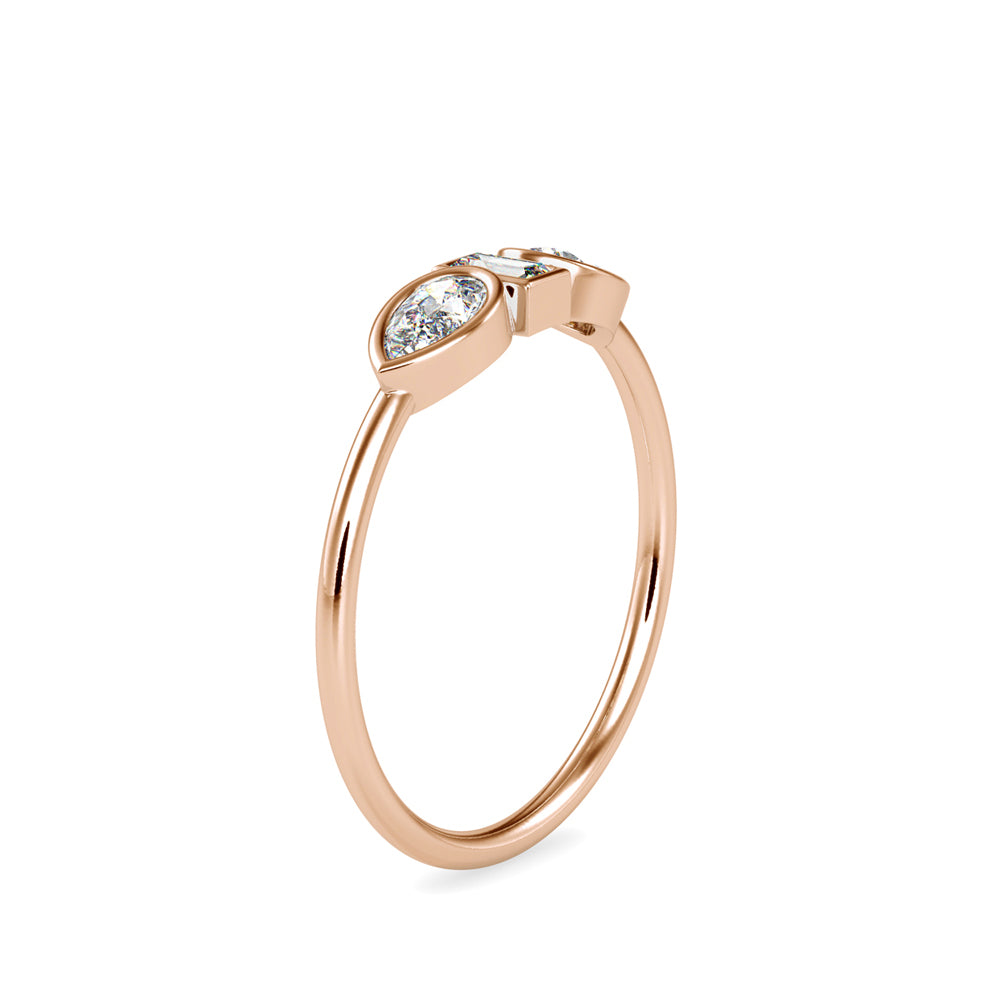 baguette bezel three stone diamond ring in rose gold