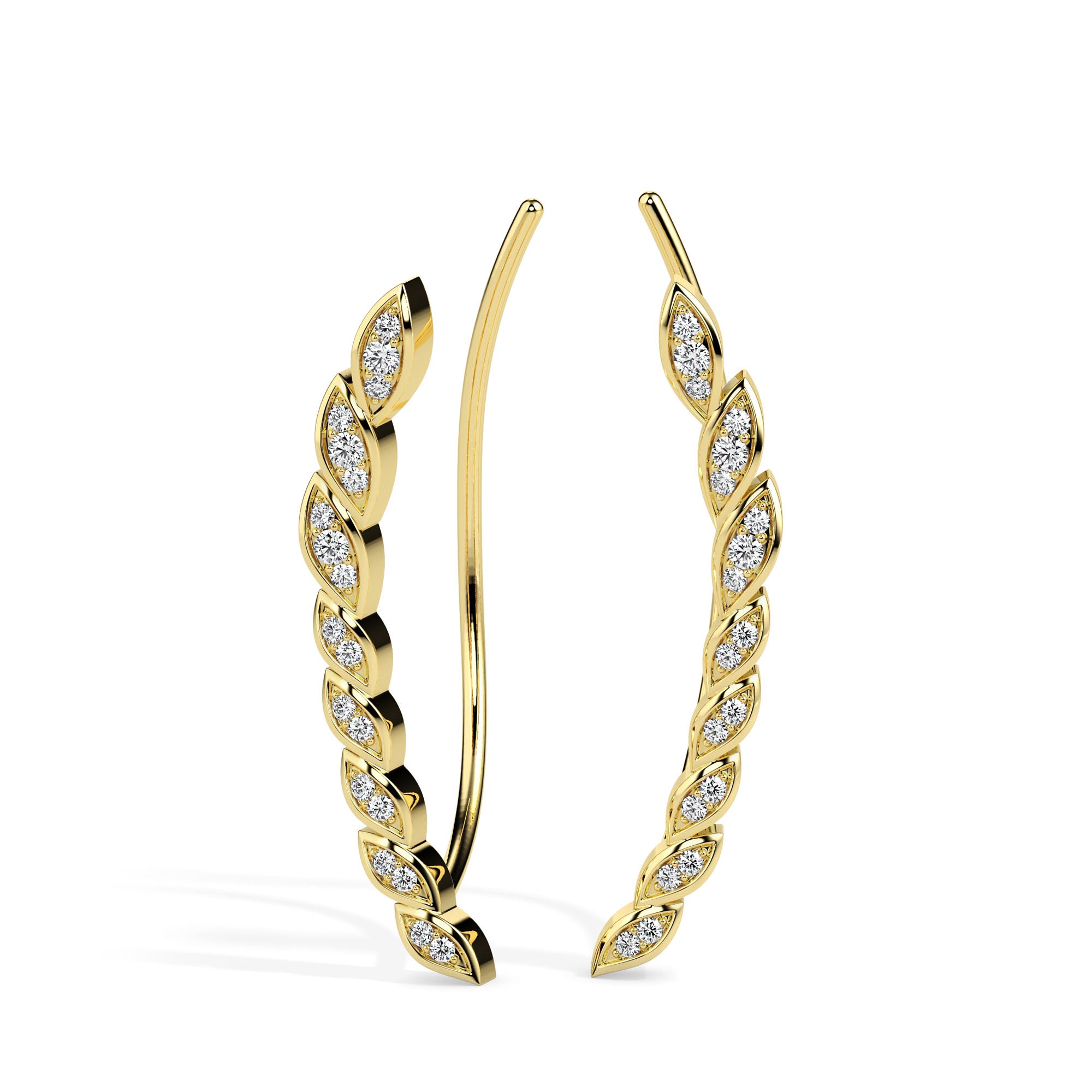 leaf shaped diamond climber earrings in yellow gold
