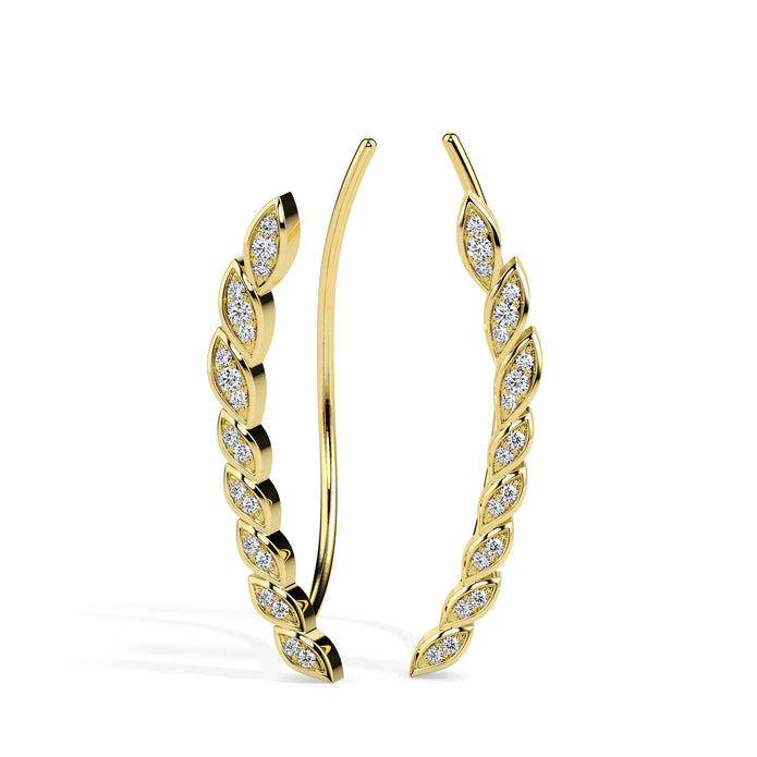 leaf shaped diamond climber earrings in yellow gold