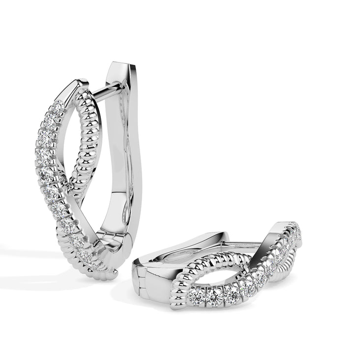 twisted infinity diamond hoop earrings in white gold