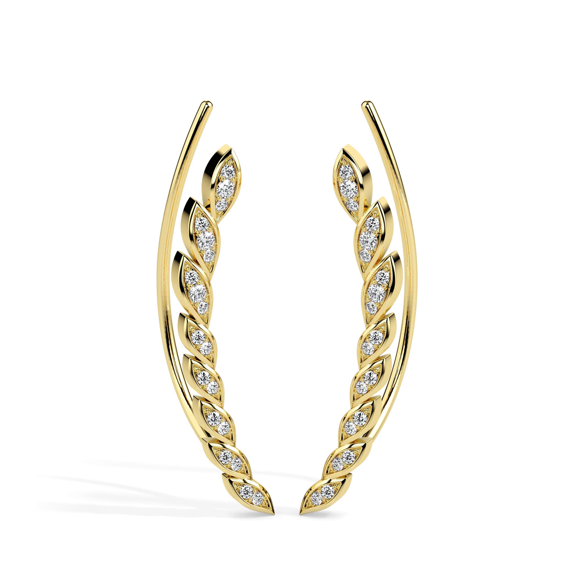 leaf shaped diamond climber earrings in yellow gold