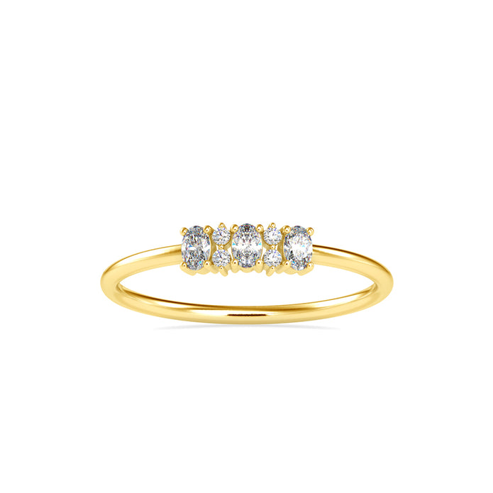 oval and round cut diamond ring in yellow gold