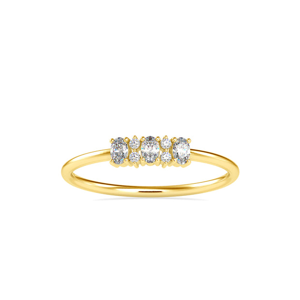 oval and round cut diamond ring in yellow gold