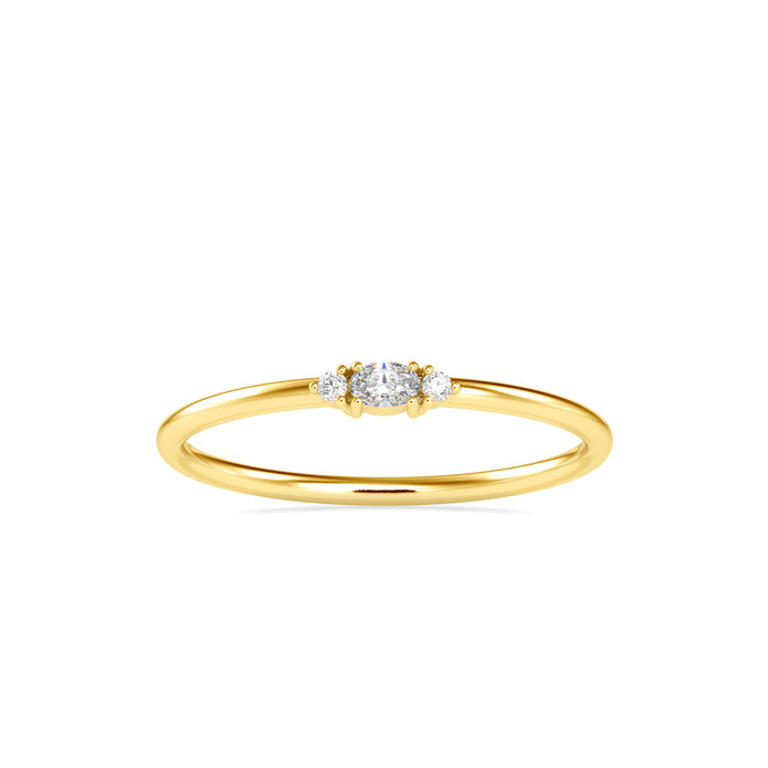 oval three stone diamond ring in yellow gold