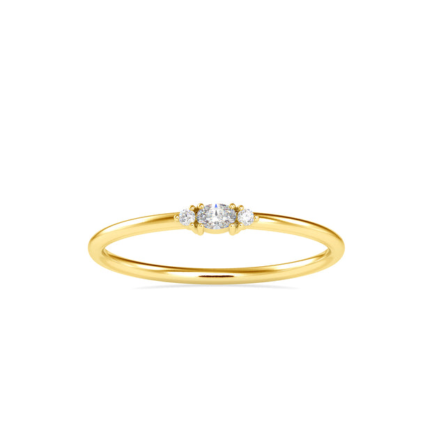oval three stone diamond ring in yellow gold