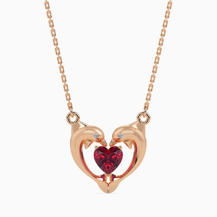 dolphin embrace red heart diamond necklace in rose gold