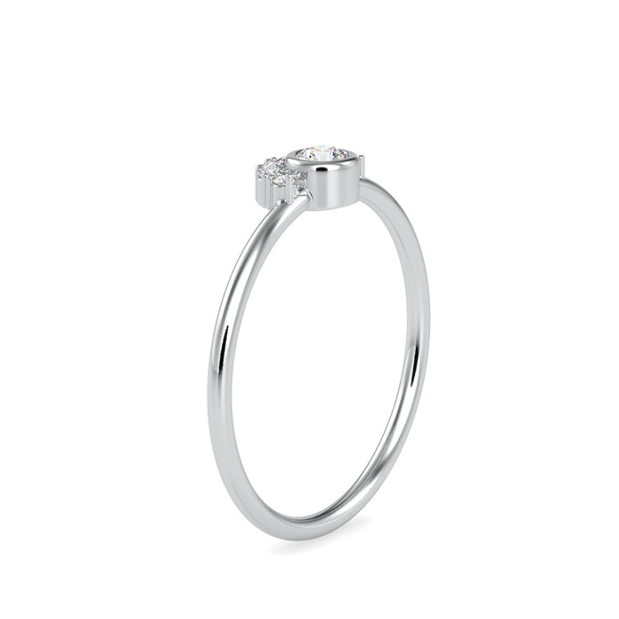 round cut bezel diamond ring in white gold