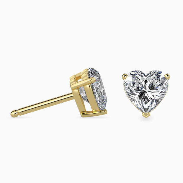 heart prong set diamond stud earrings in yellow gold
