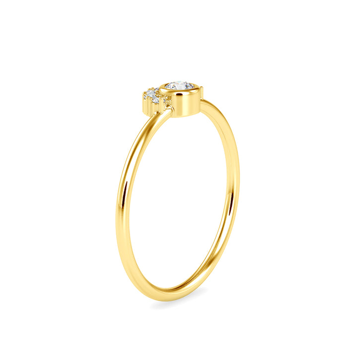 round cut bezel diamond ring in yellow gold