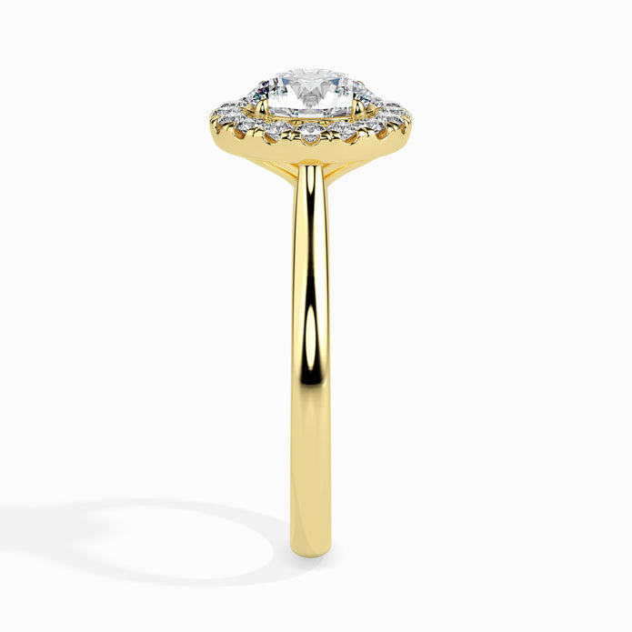 round cut halo diamond ring in yellow gold